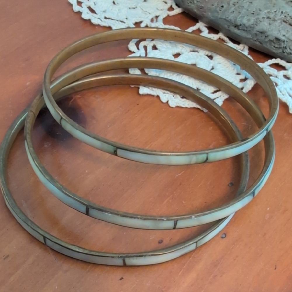 Set of Three vintage mother-of-pearl inlay bangle bracelets. 